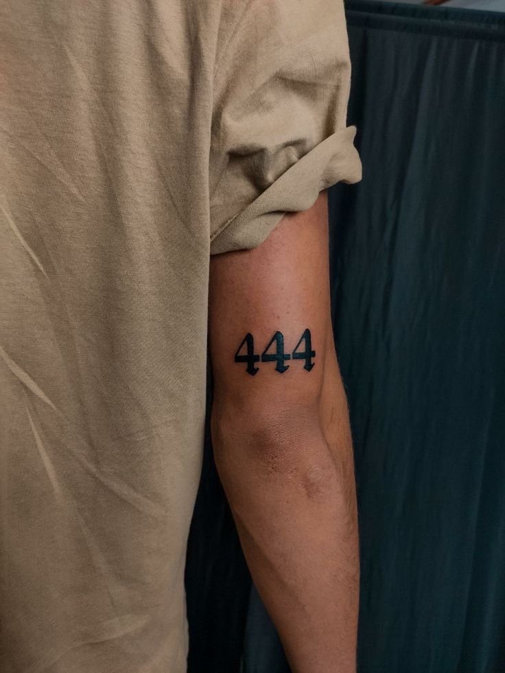 Simple Bold 444 Arm Tattoo